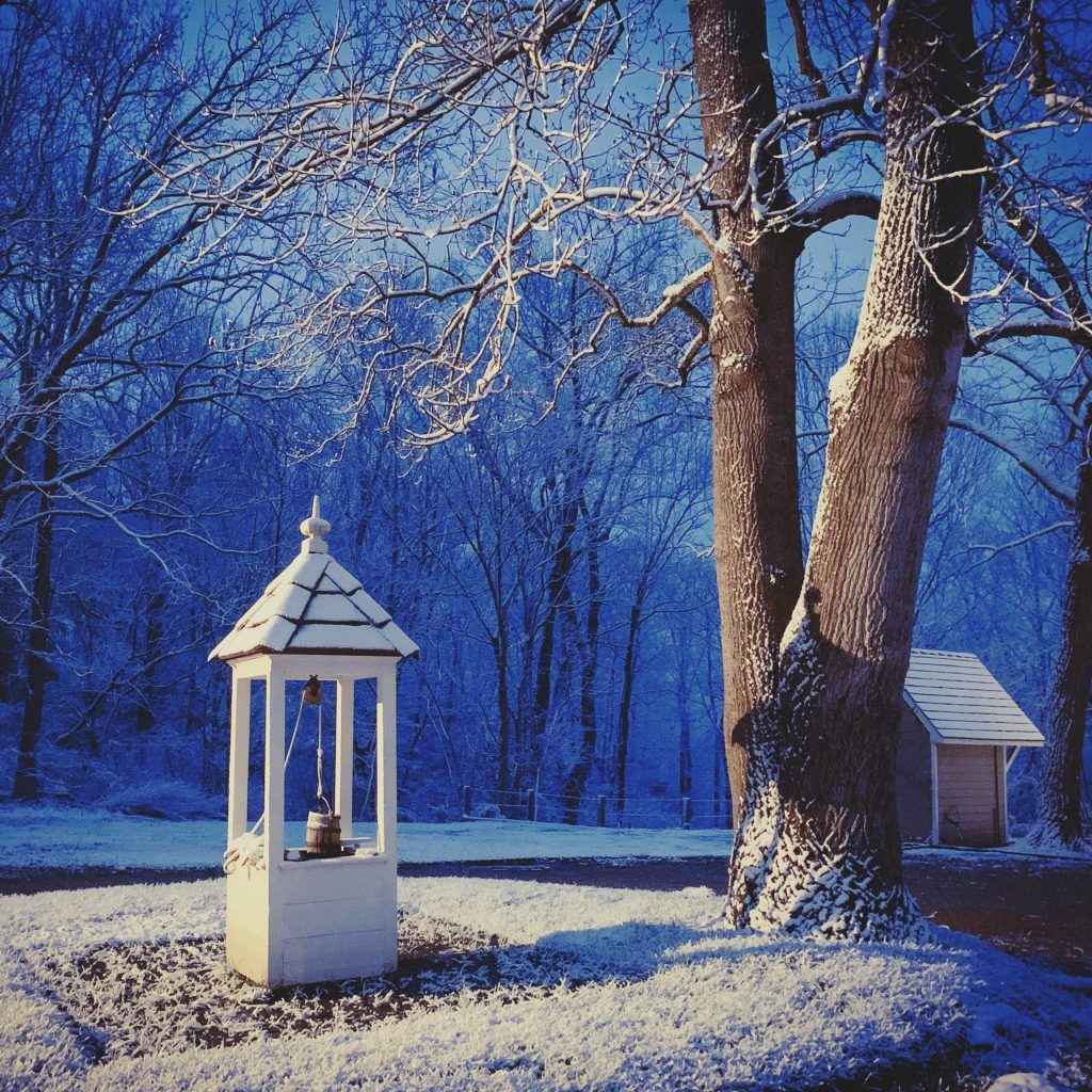 Old Well at Dawn on a Snowy January Morning